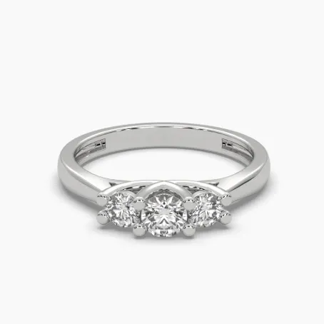 Anillo oro blanco 14k con 1 monzonita de 4mm y 2 monzonitas de 3mm