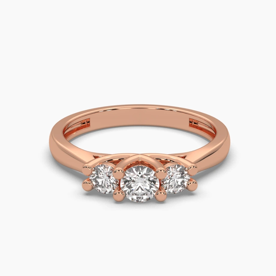 Anillo oro rosa 14k con 1 monzonita de 4mm al centro y 2 monzonitas de 3mm laterales.