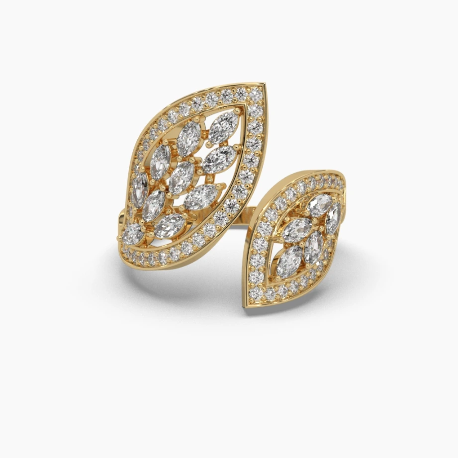 Anillo oro amarillo 14k tipo hojas con circonias varios tamaños y circonias corte marquiz en el centro.