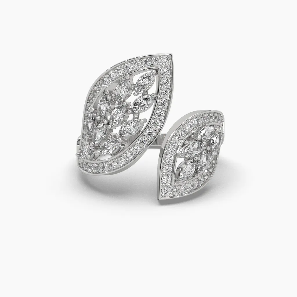 Anillo oro blanco 14k forma de hoja con monzonitas varios tamaños y monzonitas corte marquiz en el centro