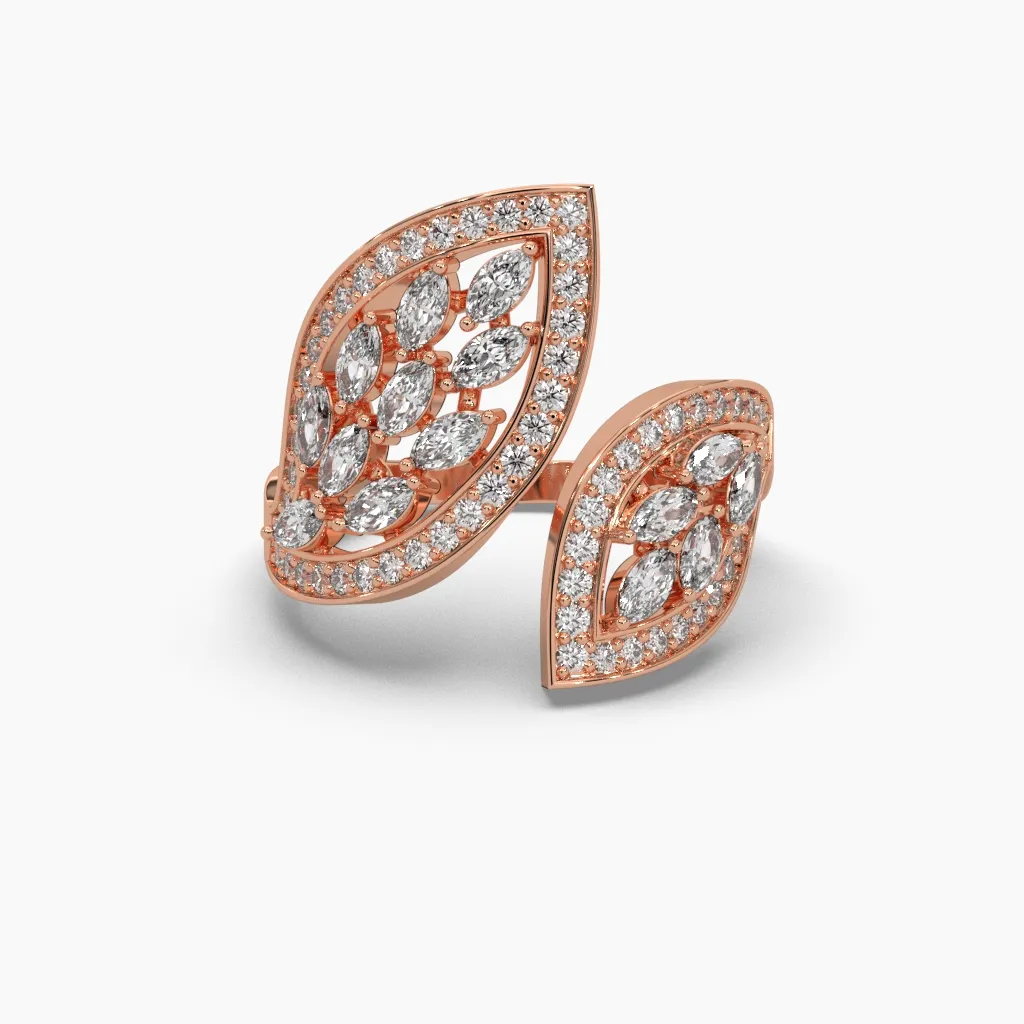 Anillo oro rosa 14k con forma de hojas y monzonitas varios tamaños y monzonitas corte marquiz en el centro.