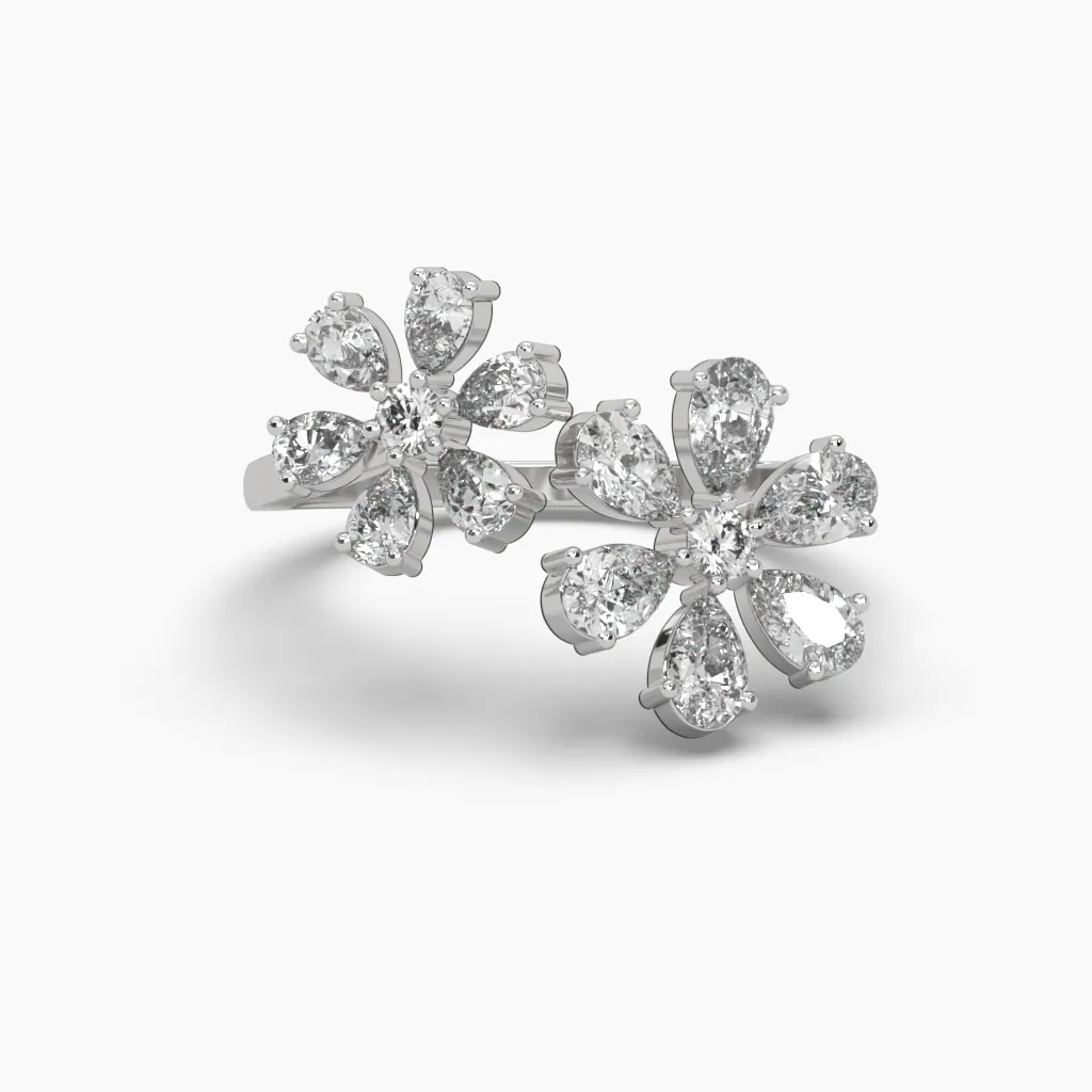 Anillo oro blanco 14k forma de flor con circonias.