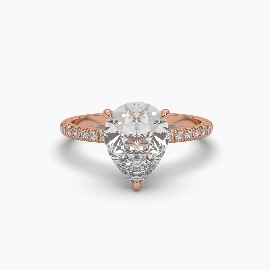 Anillo oro rosa 14k con piedra central gota circonia.