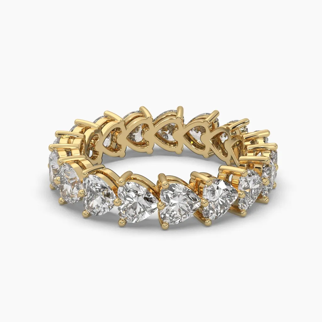 Churumbela oro amarillo 14K con circonias corte corazón.