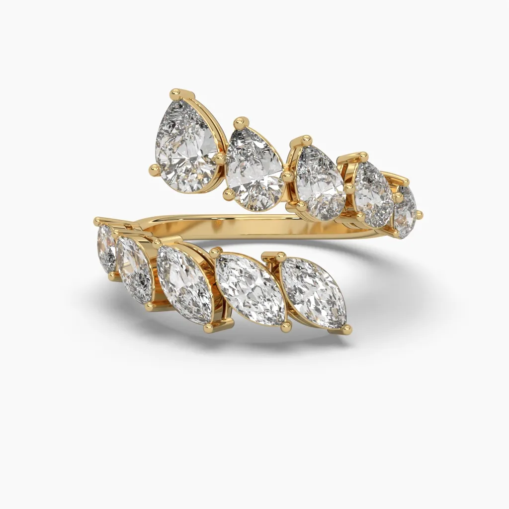Anillo oro amarillo 14k con circonias corte marquiz y gotas.