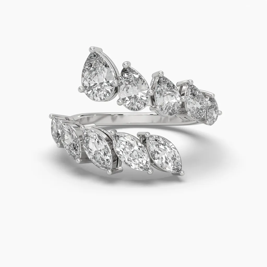 Anillo oro blanco 14k con circonias corte marquiz y gotas.