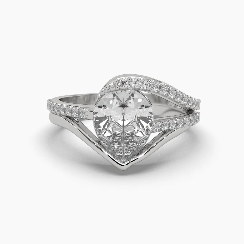 Anillo oro blanco 14k con circonias redondas y centro circonia corte gota.