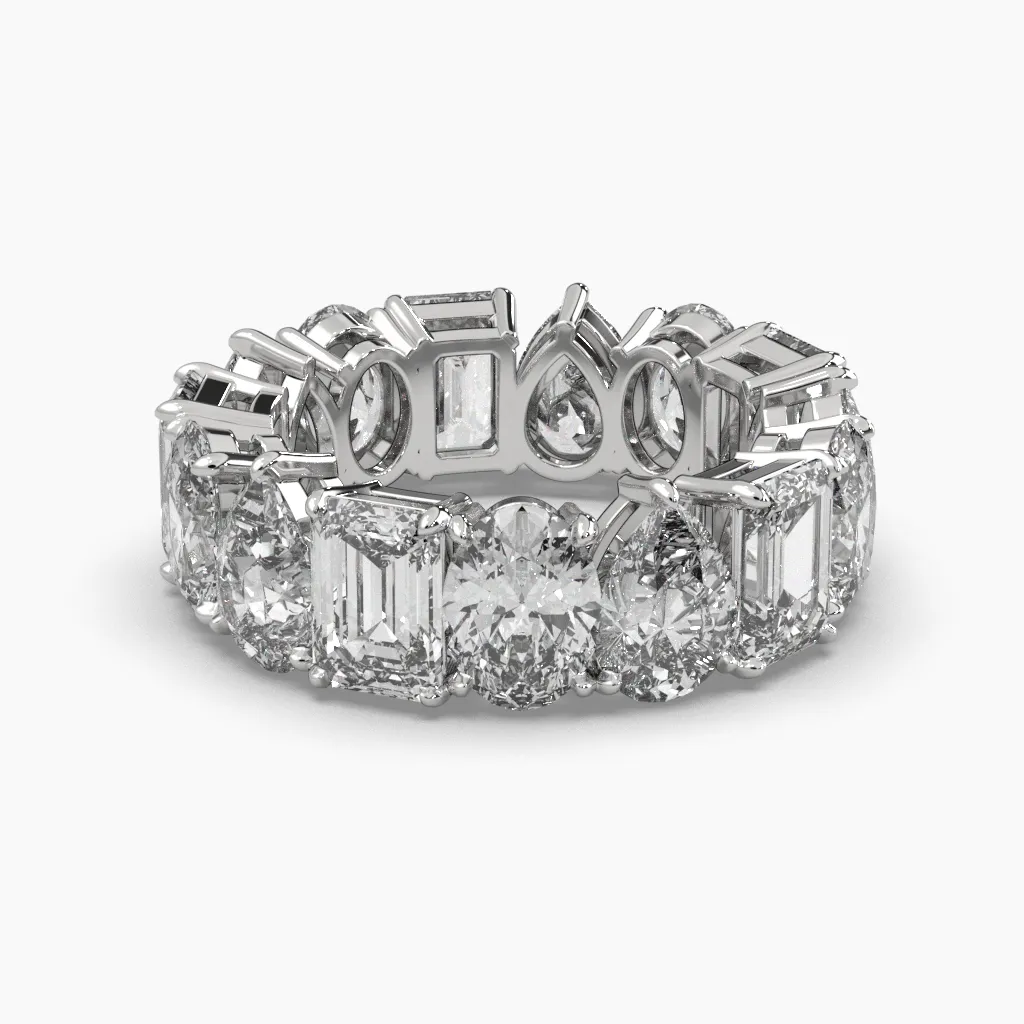 Churumbela oro blanco 14k con circonias corte gota, esmeralda y oval.