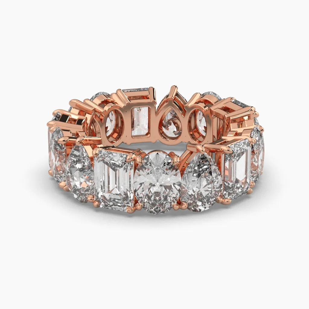 Churumbela oro rosa 14k con circonias corte gota, esmeralda y oval.