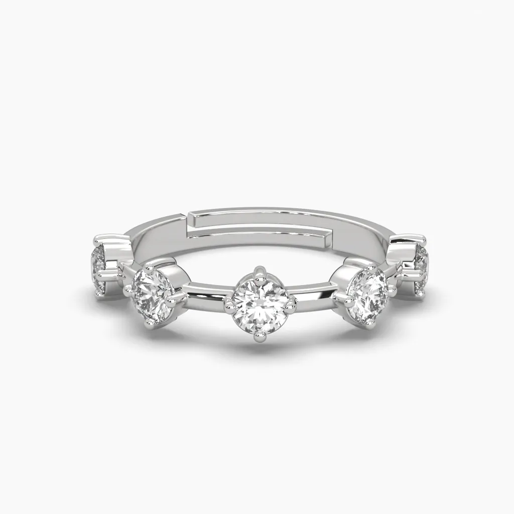 Anillo oro blanco 14k con monzonitas.