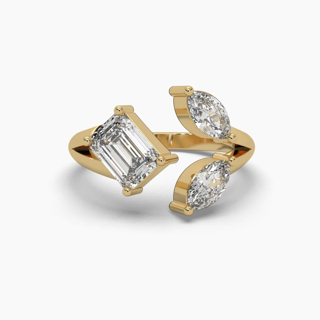 Anillo oro amarillo 14k con circonias corte esmeralda y circonias marquiz.