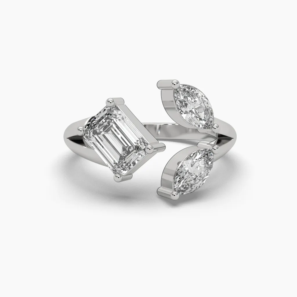 Anillo oro blanco 14k con circonias corte esmeralda y circonias marquiz.