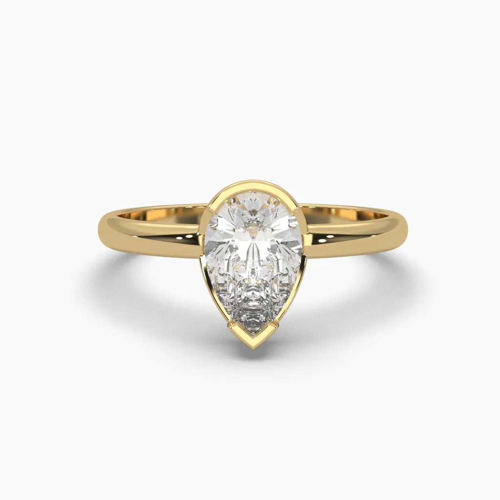 Anillo oro amarillo 14k con circonia corte gota.