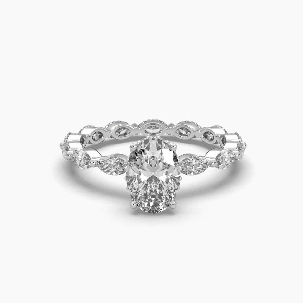 Anillo oro blanco 14k con circonias marquiz y centro oval.