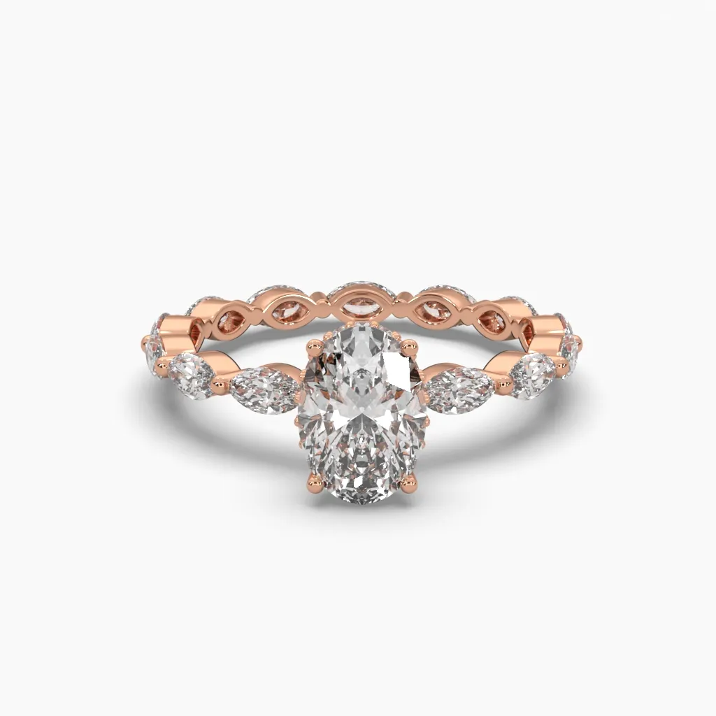 Anillo oro rosa 14k con circonias marquiz y centro oval.