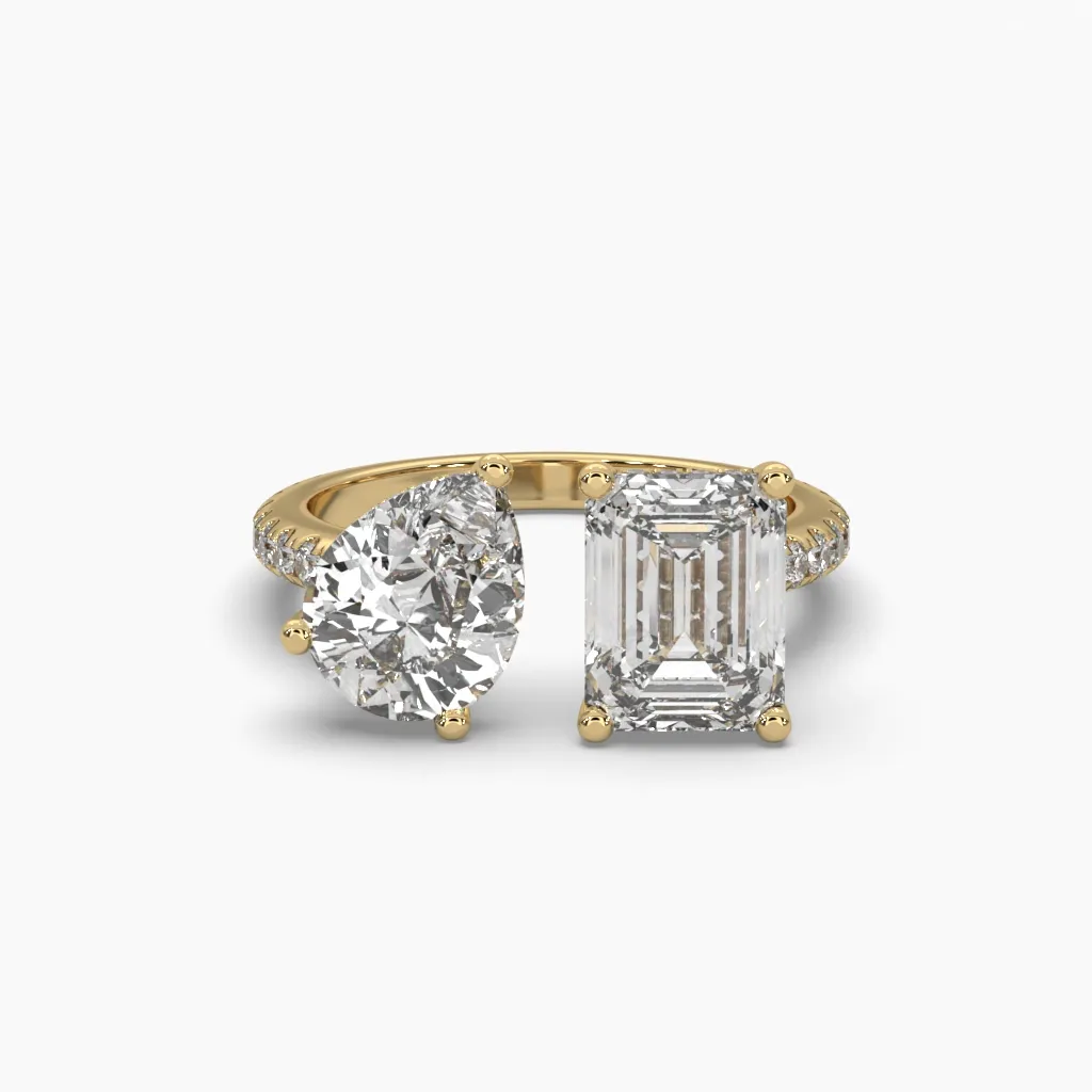 Anillo oro amarillo 14k con circonia corte esmeralda y gota.
