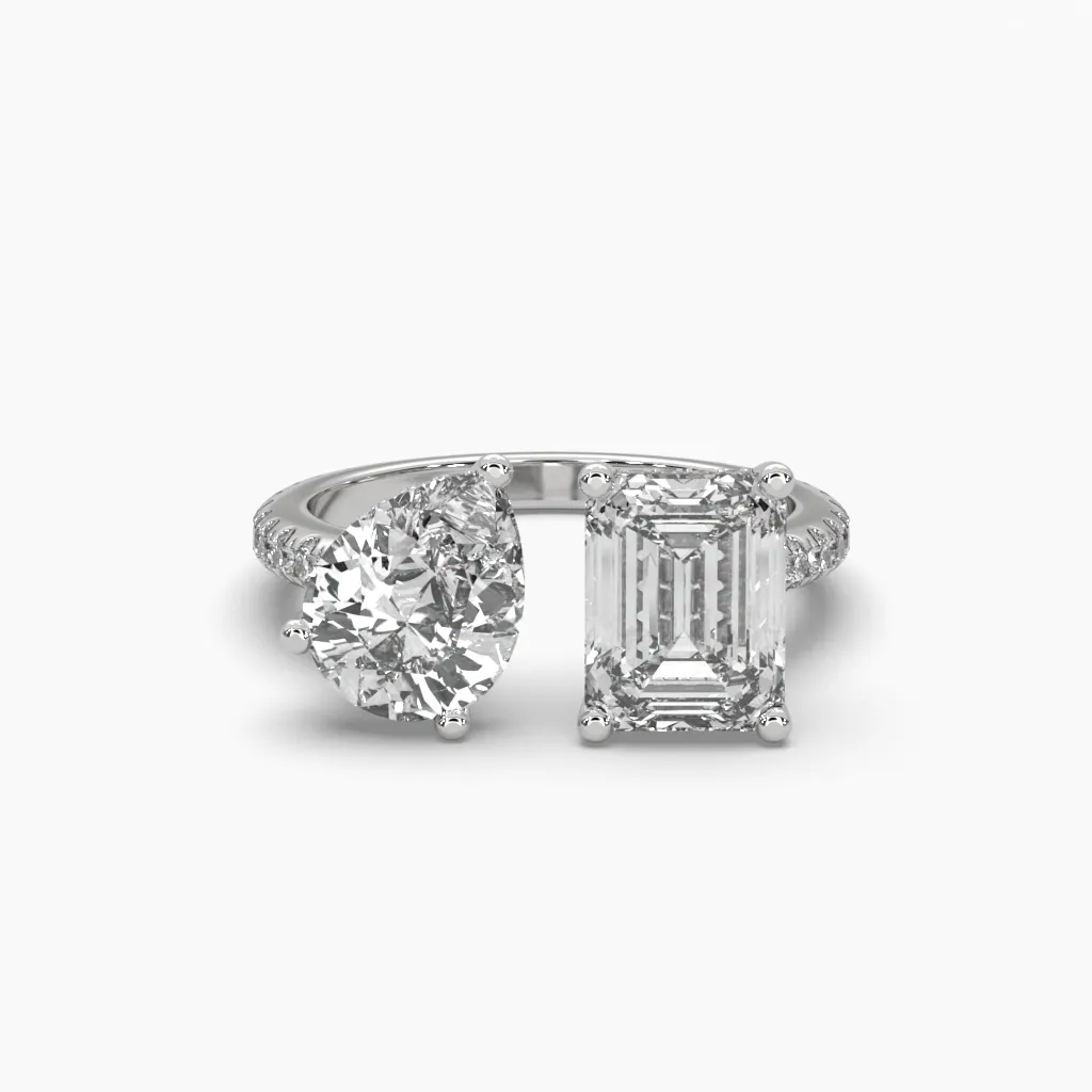 Anillo oro blanco 14k con circonia corte esmeralda y gota.